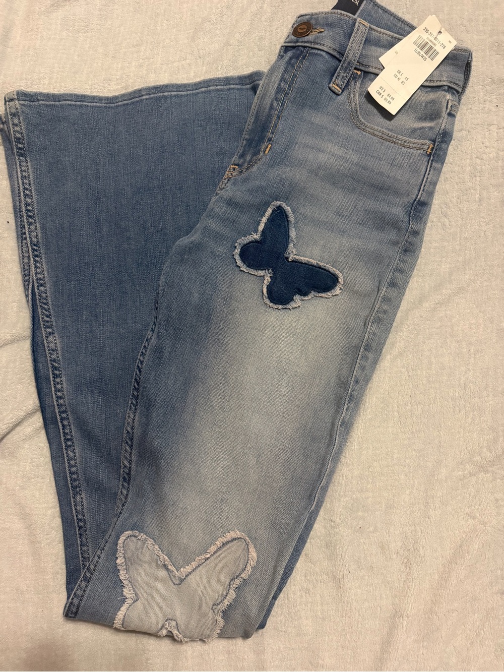 Hollister Light Blue Flare Jeans with Butterfly Appliqués